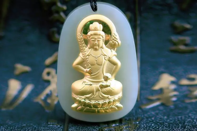 Akasagarbha Bodhisattva is often depicted holding a sword in his right hand and a lotus in his left hand