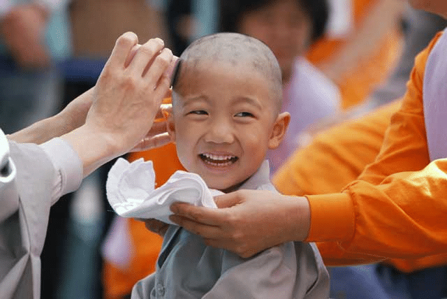 Buddhist monks shave their heads as a symbolic form of renunciation of worldly life