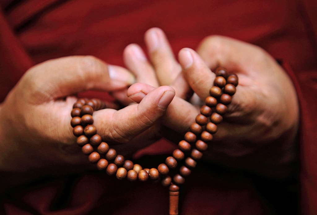 Buddhist monks use Mala beads for meditation and reciting mantras