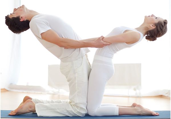 Partner camel is a yoga pose for two people